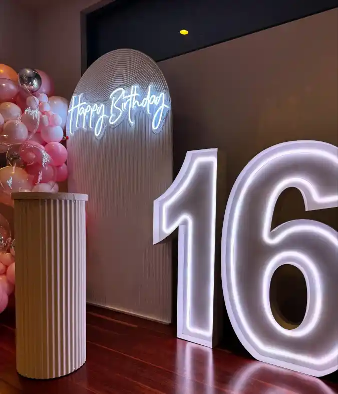 Chic Marquee Numbers and Neon Arch Backdrop
