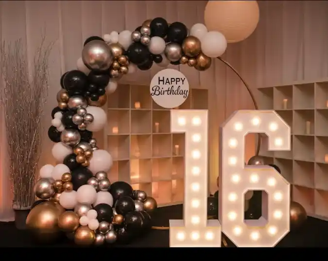 Glamorous Black, Gold, and Silver Balloon Arch with Marquee Numbers