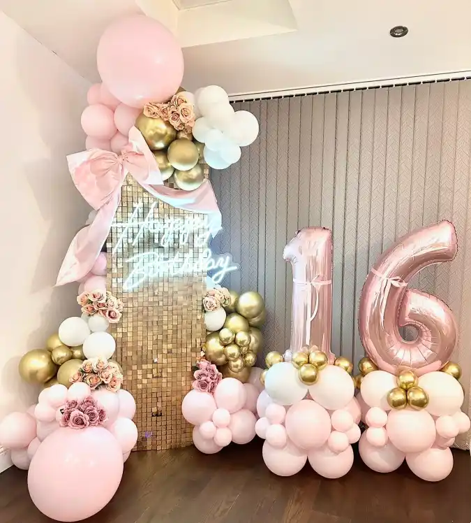 Gold and Pink Shimmer Wall with Balloons