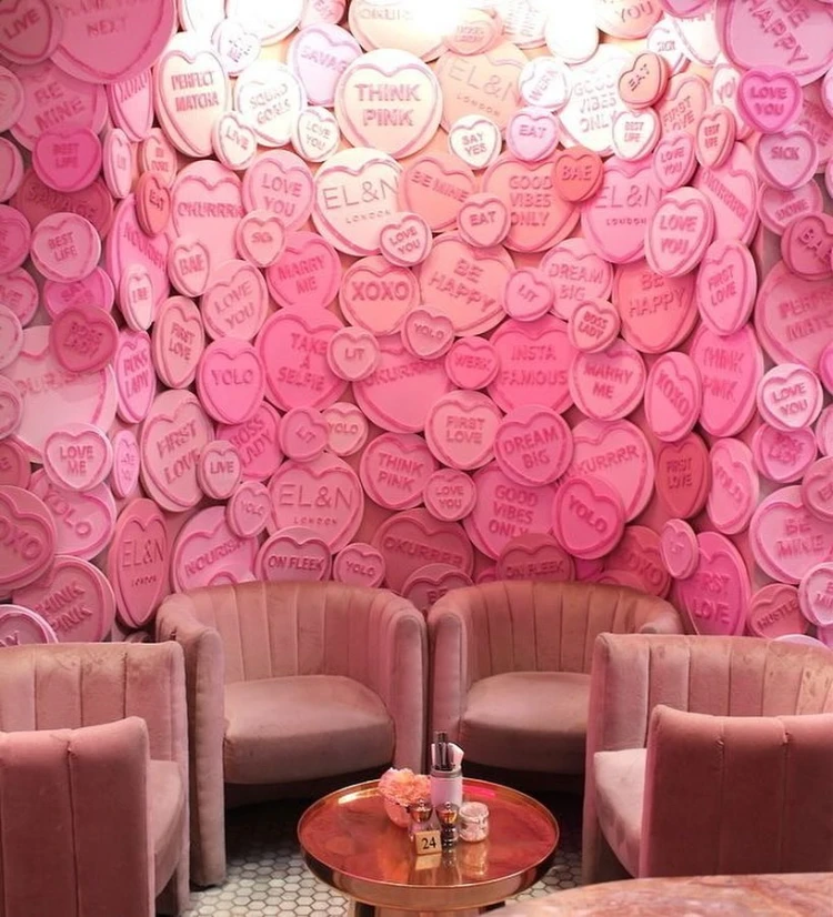 Maximalist Pink Conversation Heart Wall for a Trendy Photo Lounge